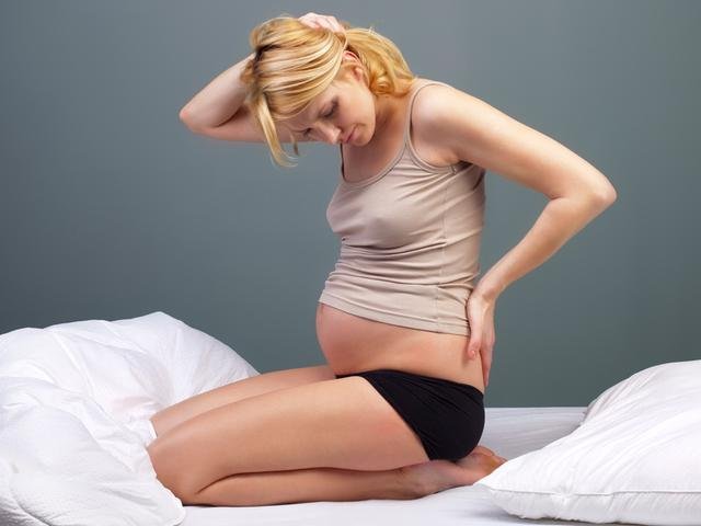 Болит поясница у беременной